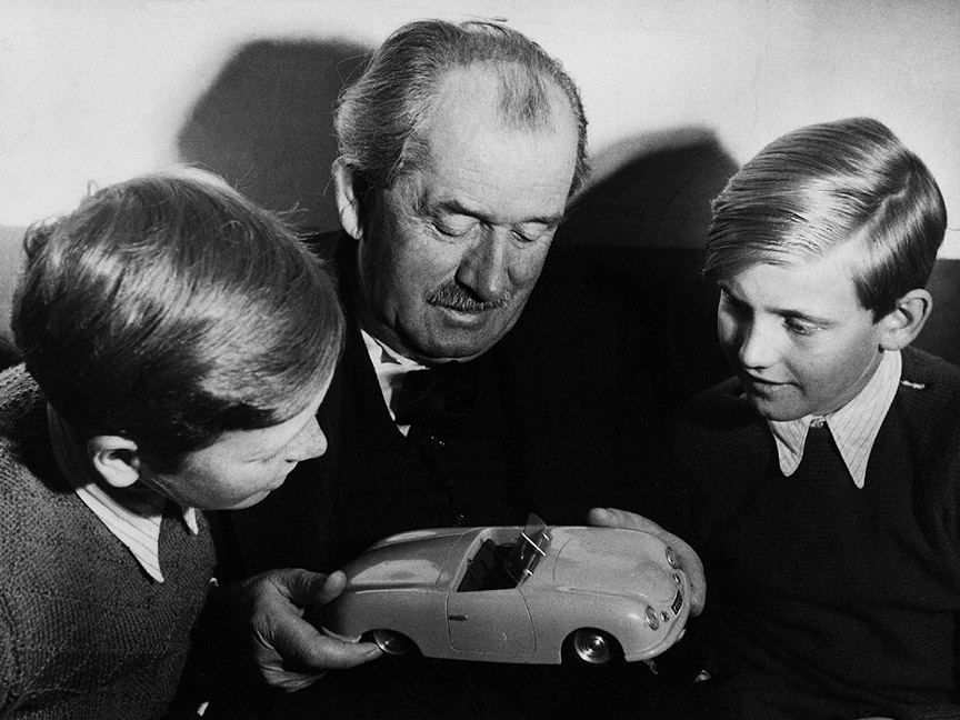 1949. Ferry's son Ferdinand Alexander "Butzi" Porsche, Ferry's father Ferdinand Porsche and Ferry's nephew Ferdinand Karl Piëch. Both young boys were to become serious players in the future - F.A.Porsche as the designer of the 911 and 904 and Ferdinand Piëch as the creator of Porsche 917, VW Phaeton, Bentley Continental GT and Bugatti Veyron.