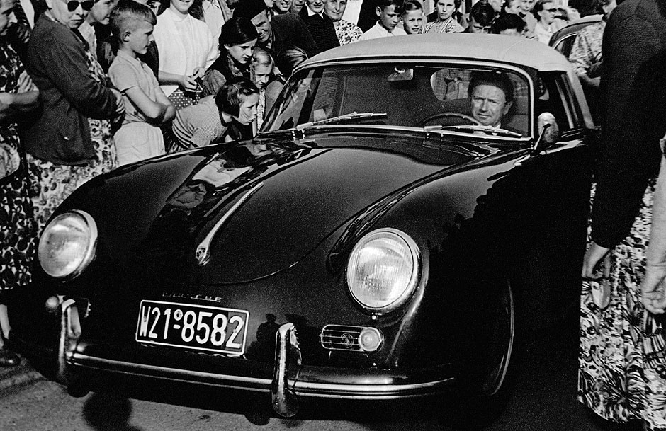 1956 September 3, VW plant in Wolfsburg. Ferry in a 1956 356A Cabriolet at the unveiling of a bust of his father on his 81st birthday anniversary.