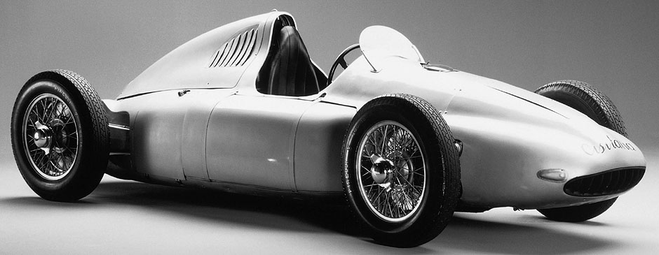Porsche type 360 Cisitalia Grand Prix. Dr. Porsche's designed unraced 1939 1.5-litre supercharged V12 Auto-Union racing car provided the basis for the design of the Cisitalia F1 car which was built around a mid mounted supercharged 1.5L flat-12 engine. The car was designed by Porsche in Austria and built by Cisitalia in Italy. The engine was designed for 300 hp giving a top speed of 300 km/h. Later bench tests showed about 385 bhp at 10,500 rpm. The chassis was of chromoly tubing. The car had 4WD system with disconnectable front drive!