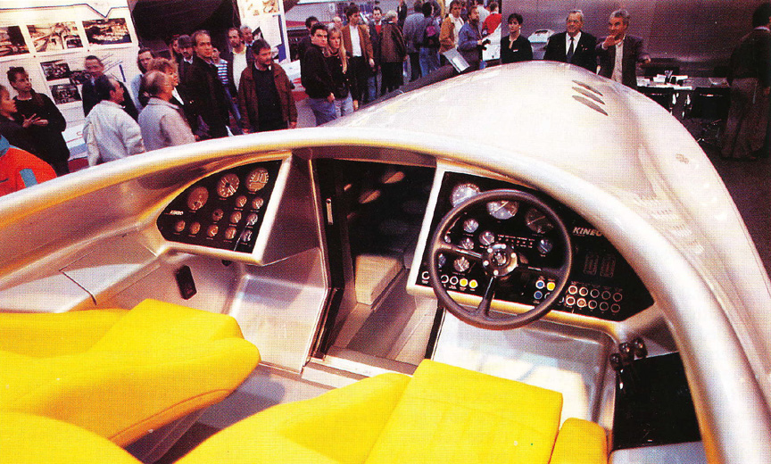 The dashboard design is now with the "frame" like it was shown on the scale model. The dash was different on the first MC prototype, but Porsche Design ordered to use their initial design. The photo shows also the removable cabin seat cushion, which covers the VacuFlush toilet seat.
