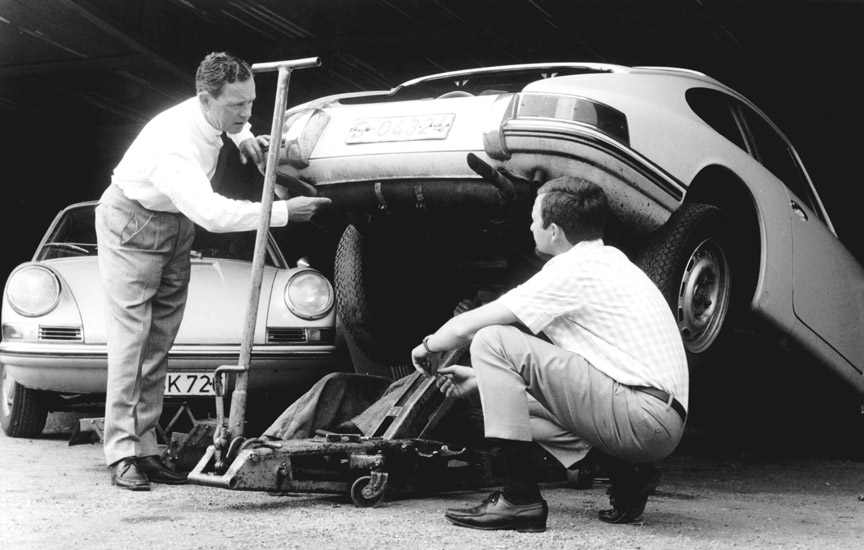 Ferry and his son Ferdinand Alexander (the designer of 901/911) with the 901/911 prototype (note the twin exhaust pipes)