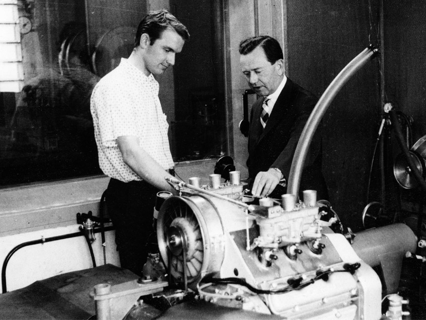 Nephew Ferdinand Piëch and Ferry discussing the new 6-cylinder engine. 