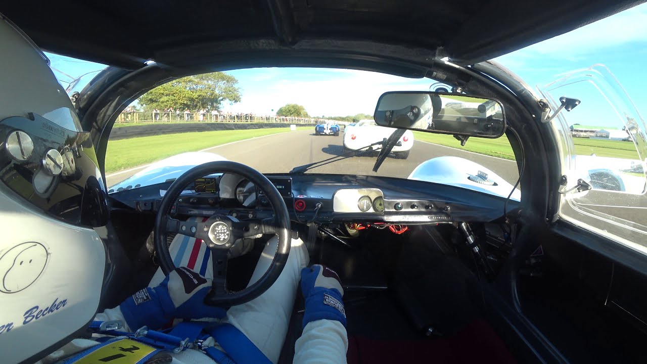 GOODWOOD REVIVAL 2019, Battle between 2 PORSCHE 910 in a field of lolas and mclaren w big V8 s