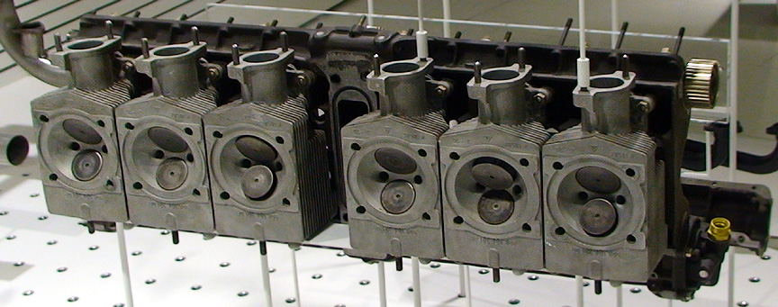 Cylinder heads with inlet and exhaust valves. 
