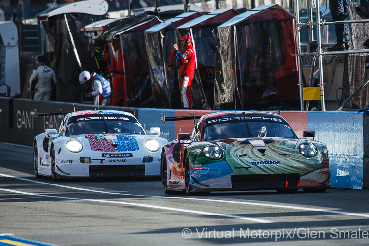 Awaiting the green light to begin the evening practice session is the #56 Team Project 1 Porsche 911 RSR (GTE Am) driven by Jörg Bergmeister, Patrick Lindsey and Egidio Perfetti Awaiting the green light to begin the evening practice session is the #56 Team Project 1 Porsche 911 RSR (GTE Am) driven by Jörg Bergmeister, Patrick Lindsey and Egidio Perfetti