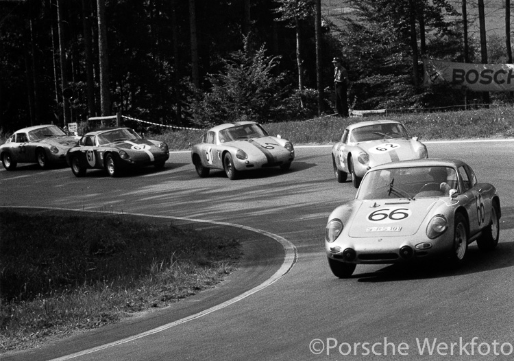 Solitude DARM, 28 July 1963: The #66 Porsche 356 B 2000 Carrera GS/GT of Jo Bonnier leads a pack of cars in the early stages