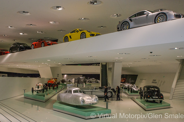 View of the Porsche Museum exhibition hall – in the foreground is a recreation of the Type 64 Porsche Berlin-Rome race car