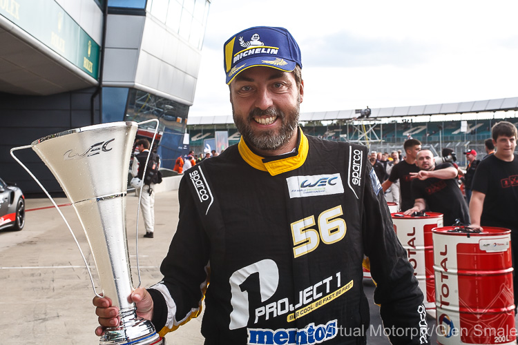 Egidio Perfetti from the #56 Team Project 1 Porsche 911 RSR LMGTE Am in jubilant mood after finishing 3rd in the 6 Hours of Silverstone Egidio Perfetti from the #56 Team Project 1 Porsche 911 RSR LMGTE Am in jubilant mood after finishing 3rd in the 6 Hours of Silverstone