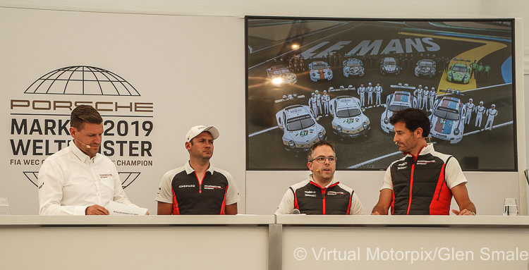  Porsche PR manager, Oliver Hilger (left), puts factory driver Nick Tandy (2nd from left), Director Factory Motorsport Pascal Zurlinden (3rd from left) and Mark Webber (right)