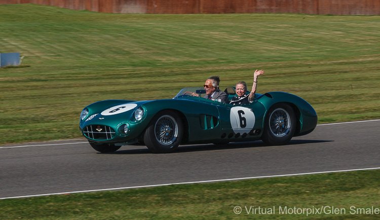 The Duke of Richmond takes Lady Susie Moss on a demonstration run in the 1959 Aston Martin DBR1 to celebrate Sir Stirling Moss 90th birthday