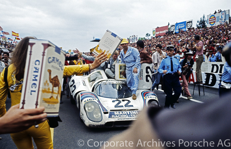 The #22 Martini 917 K of Helmut Marko and Gijs van Lennep celebrates its victory in front of a huge crowd