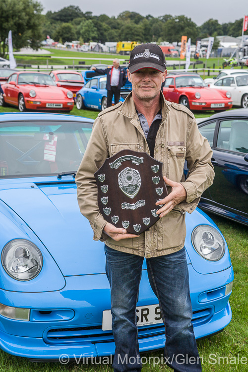 Owner Steve stands proudly with Vincent Mansueto Trophy alongside his Porsche 993 Carrera RS