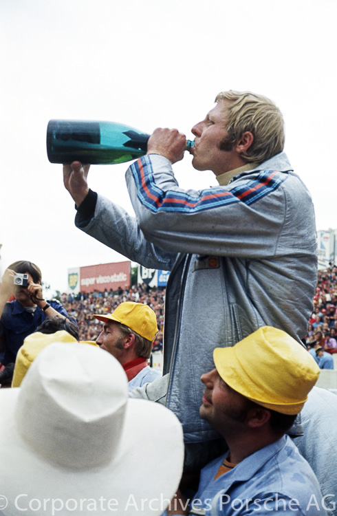 Gijs van Lennep enjoys a celebratory drink of champagne