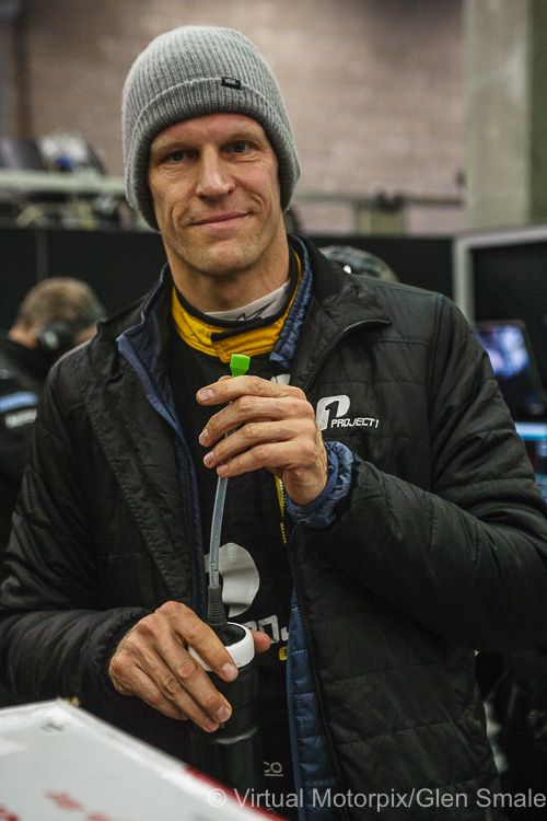 Jörg Bergmeister relaxes in the team’s pit garage after practice in the #56 Team Project 1 Porsche 911 RSR LMGTE Am Jörg Bergmeister relaxes in the team’s pit garage after practice in the #56 Team Project 1 Porsche 911 RSR LMGTE Am