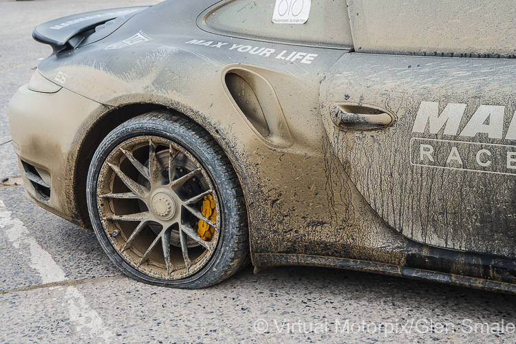 When the Porsche 911 Turbo S lost its headlight in the car’s multiple spin at 200 mph, it knocked off the fuel filler cap, and caked the rest of the car in sand and mud When the Porsche 911 Turbo S lost its headlight in the car’s multiple spin at 200 mph, it knocked off the fuel filler cap, and caked the rest of the car in sand and mud