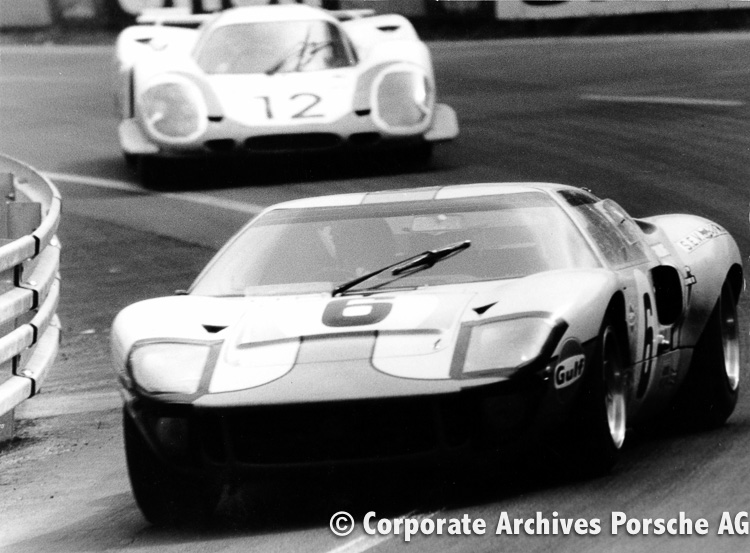 No. 6 Ford GT40 of Ickx/Oliver is chased by the No. 12 Porsche 917 of Vic Elford/Richard Attwood
