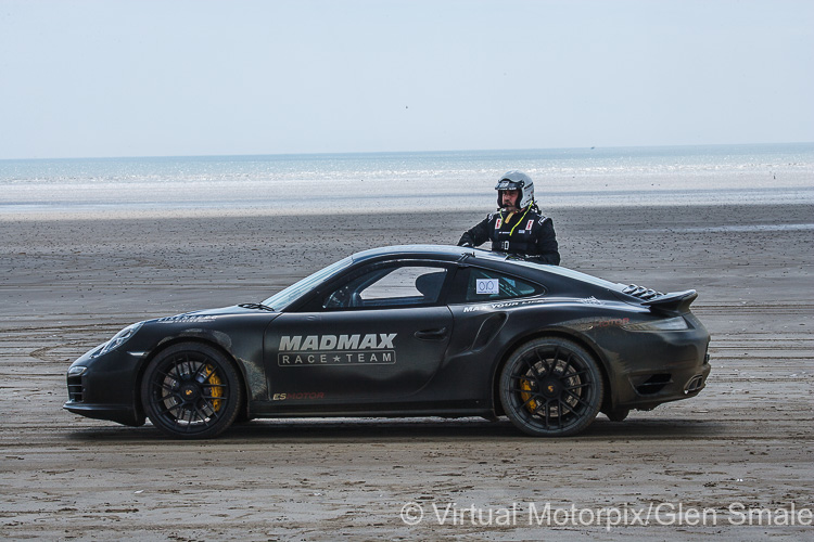 Zef Eisenberg climbs from the Porsche 911 Turbo S