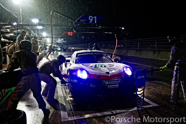 #91 Porsche 911 RSR of Gianmaria Bruni and Richard Lietz calls into the pits