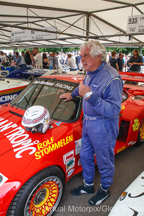Brian Redman climbs out of the #70 Porsche 935 ‘Old Warhorse’ at the Goodwood Festival of Speed, 2015