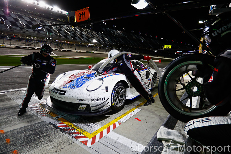 The #911 Porsche 911 RSR of Patrick Pilet, Nick Tandy and Frederic Makowiecki calls into the pits