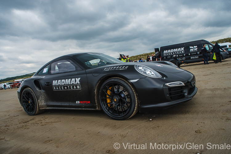 The 2015 Porsche 911 Turbo S waits on the beach to be driven by Zef Eisenberg