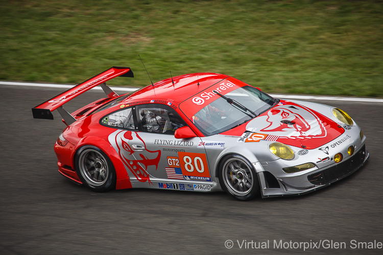 The #80 Flying Lizard Motorsports Porsche 997 GT3 RSR of Seth Neiman, Darren Law and Jörg Bergmeister