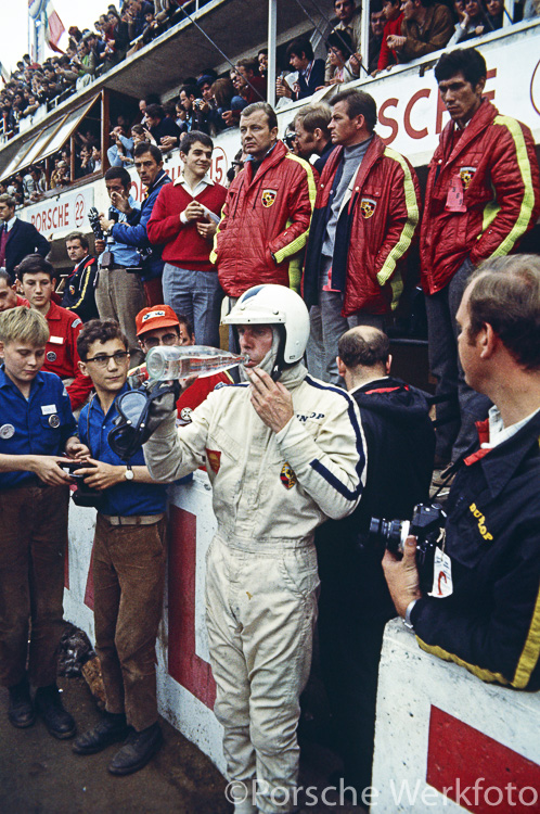 Richard Attwood enjoying a drink of water after his stint in the 1969 Le Mans 24 Hour