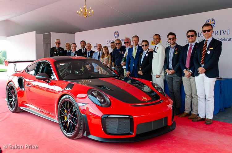 The judging panel pose with sponsors and organisers during the Concours Masters Celebration of 70 Years of Porsche