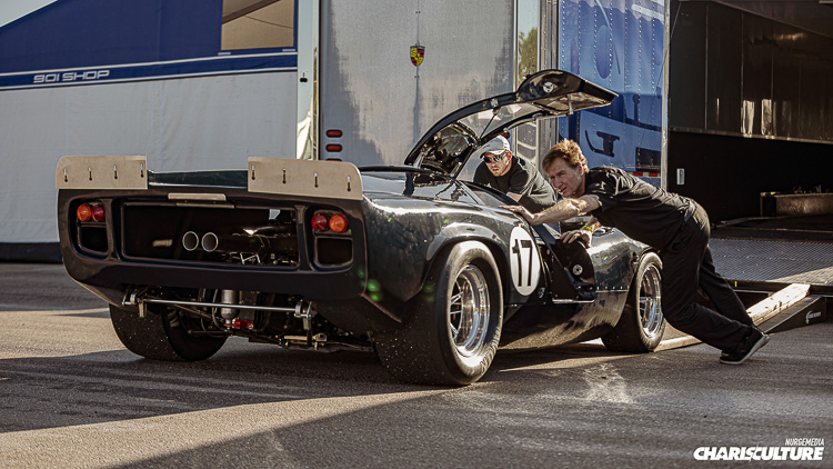 Lola T70 being pushed into its pit garage