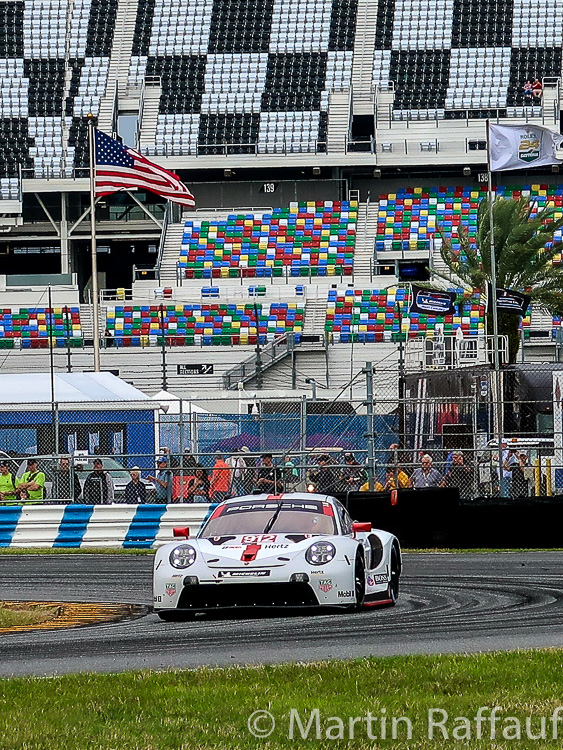 The #912 Porsche exits the infield East Horseshoe corner The #912 Porsche exits the infield East Horseshoe corner