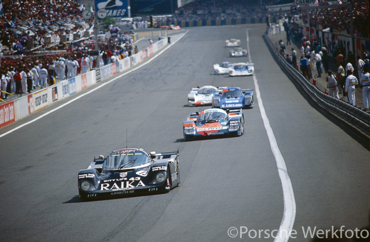Just after the start of the race, the #15 Richard Lloyd Racing Porsche 962 GTi of Steven Andskar, David Hobbs and Damon Hill passes the pits 