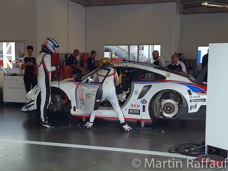 The Porsche squad is using the time productively, practicing driver changes in the #912 car