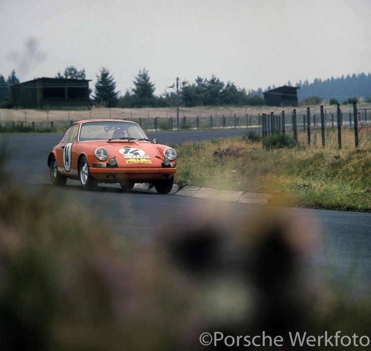 The winning #14 Porsche 911 R Sportomatic driven by Hans Herrmann/Jochen Neerpasch/Vic Elford