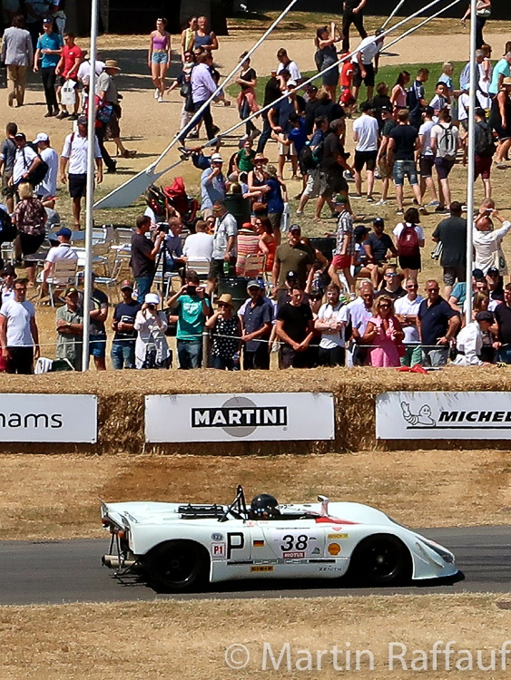 Porsche 908-02 speeds past Goodwood House