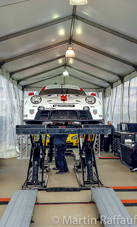 One of the Porsches goes through IMSA tech Inspection One of the Porsches goes through IMSA tech Inspection