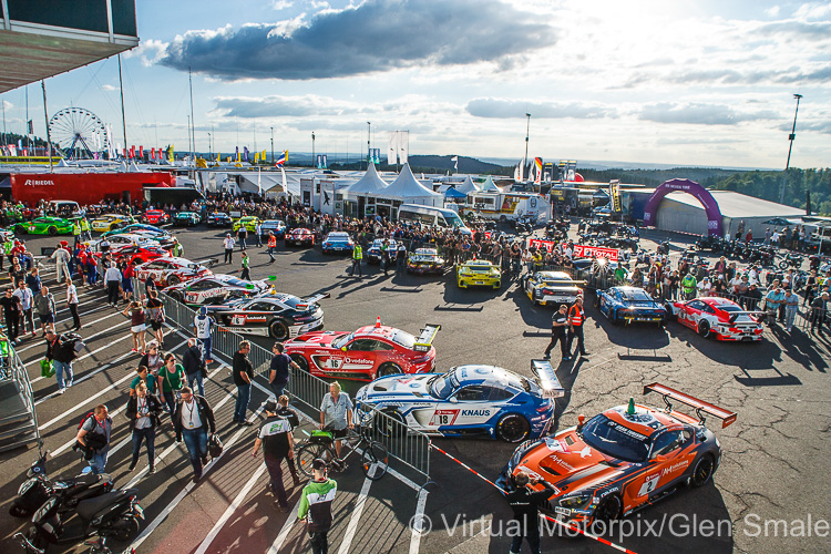 View of the paddock with cars following the Friday afternoon qualifying session
