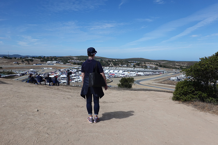 Kim Copperthite watches the Porsche 919 Hybrid Evo during its record run at the Porsche Rennsport Reunion VI, Laguna Seca, 2018