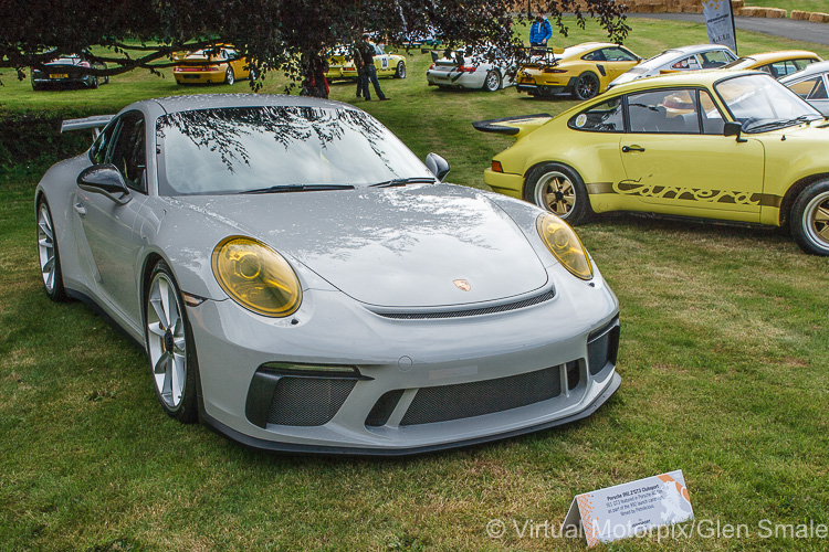 A Porsche 991.2 GT3 Clubsport sits amongst other Porsche classic sports cars