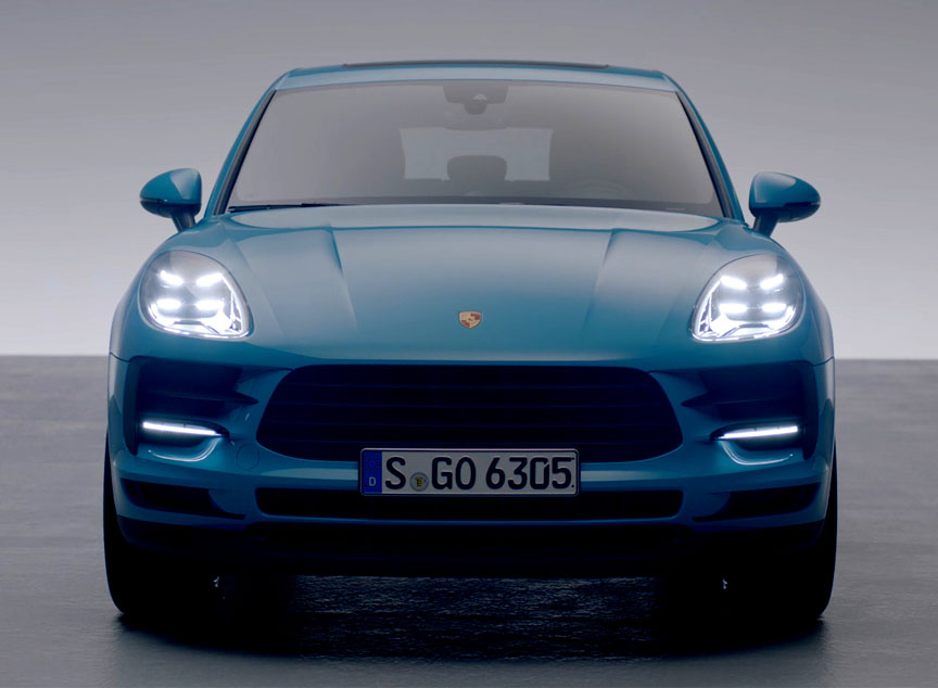 Porsche Macan 95B.2 front view, lights on