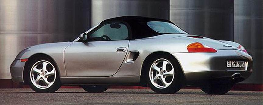 Silver Porsche Boxster 986 with black soft top