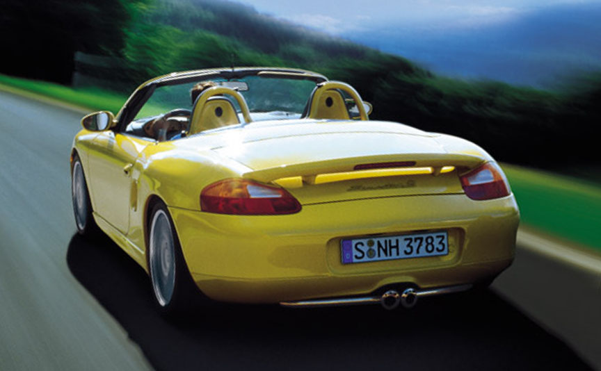 Yellow Porsche Boxster 986 S with fixed rear spoiler