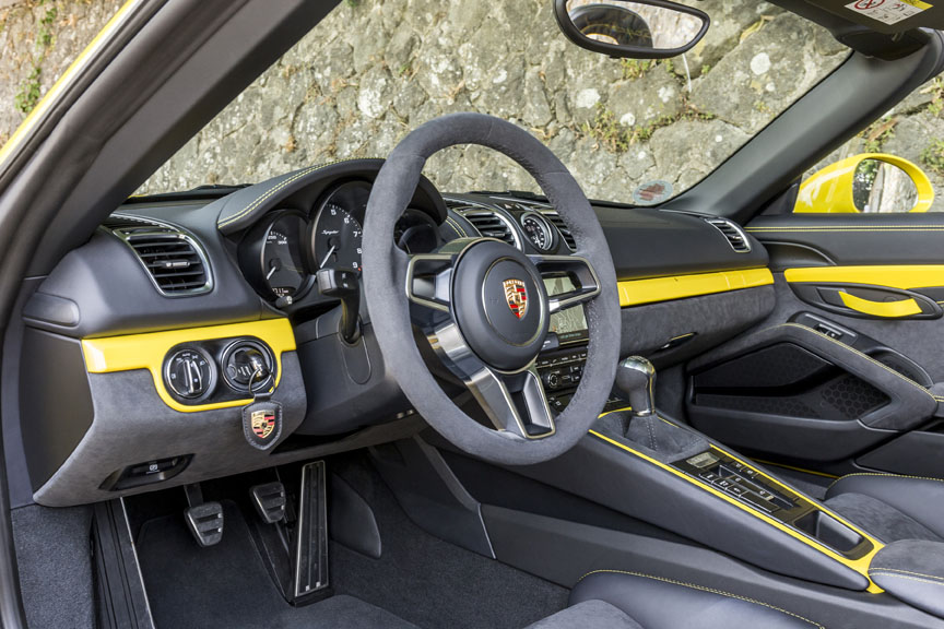 Porsche Boxster 981 Spyder cockpit with yellow accent