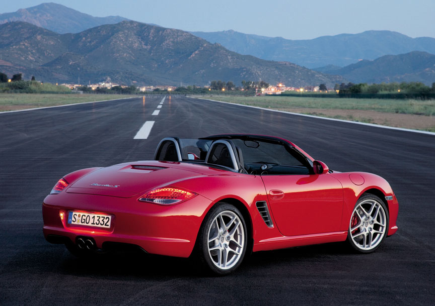 Guards Red Porsche Boxster S (987 facelifft) on an airstrip