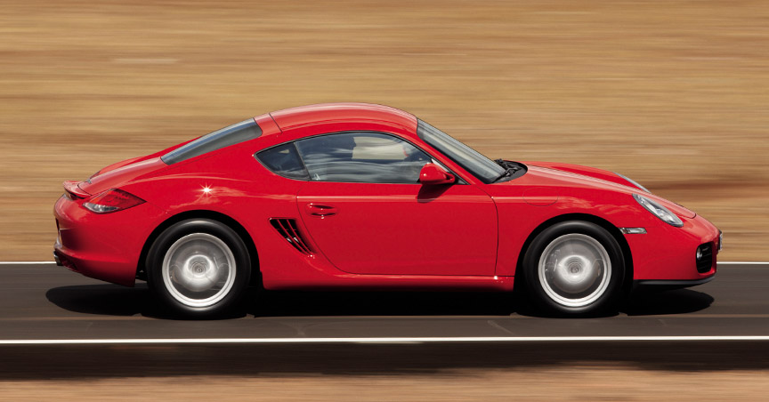 Red Porsche Cayman 987.2, side view