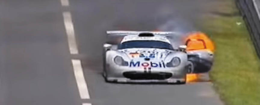 1997 Le Mans Porsche 911 GT1 Evo driven by Ralf Kelleners, in fire
