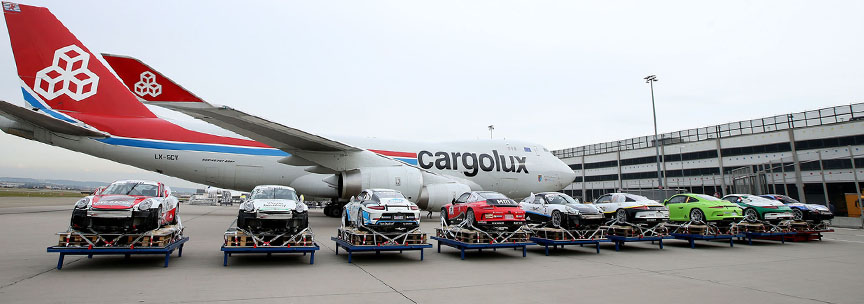 Porsche 911 GT3 Cup cars packed into the jumbo cargo jet