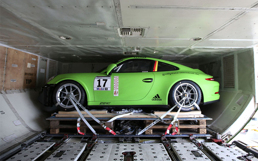 Porsche 911 GT3 Cup car packed into the jumbo cargo jet
