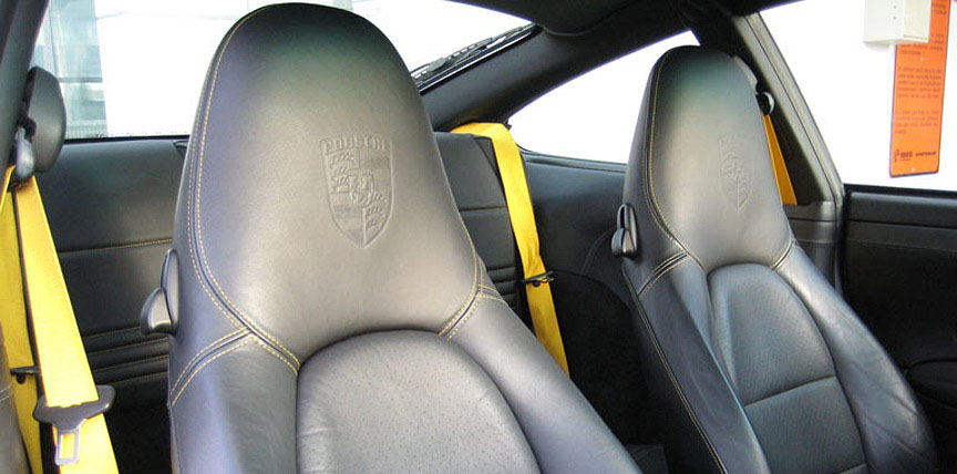 Porsche 911 996 black seats with yellow seams and seat belts