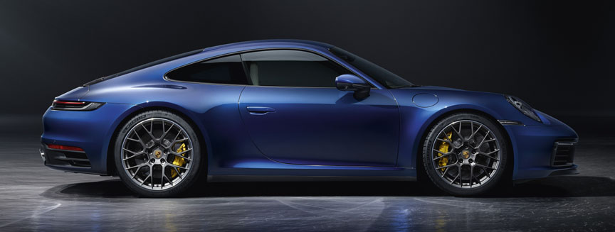 Porsche 911 992 (2020 model) side view, dark blue metallic