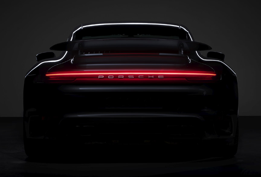 Porsche 911 992 Turbo S rear view in the dark